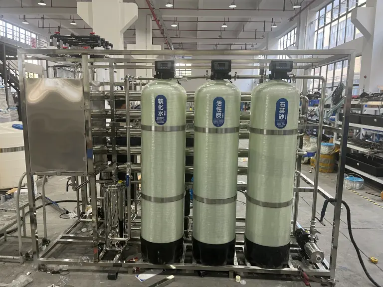 Pretreatment vessels for multimedia filtration, activated carbon and softening mounted on a stainless steel frame