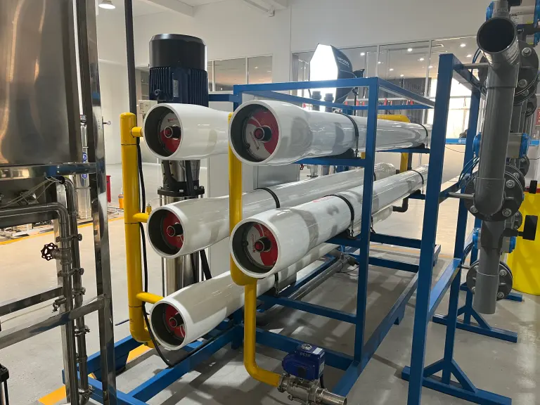 Reverse osmosis membrane pressure vessels and high-pressure pump on a multi-stage rack