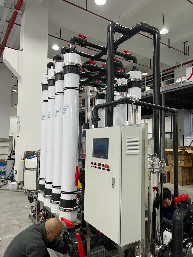 Control cabinet with touch screen monitoring membrane water treatment modules during commissioning