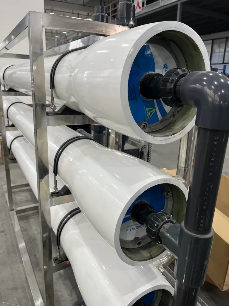 Close-up of membrane element end faces inside pressure vessels with process piping